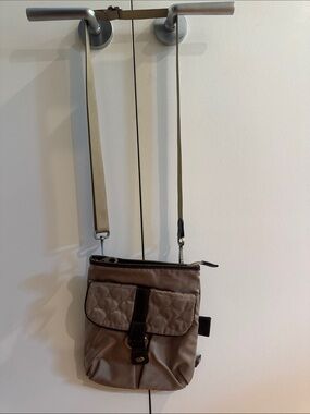 Compact Women's Crossbody Bag in Taupe with Quilted Flap. Excellent for travel!
